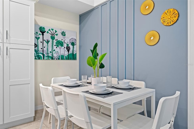 dining room featuring light tile patterned flooring