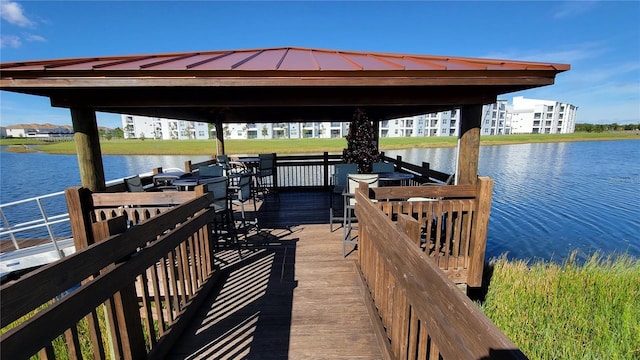 dock area featuring a gazebo and a water view