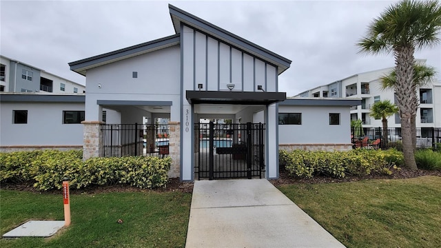 view of building exterior with fence