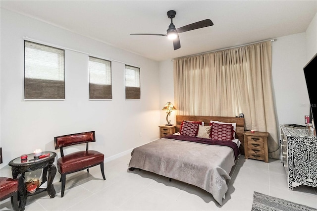 bedroom featuring ceiling fan and light tile patterned floors