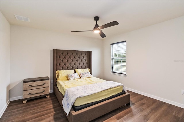 bedroom featuring dark hardwood / wood-style floors and ceiling fan