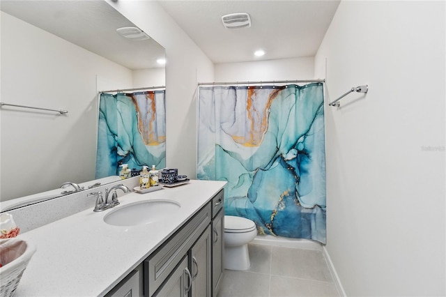 bathroom featuring a shower with shower curtain, tile patterned floors, vanity, and toilet