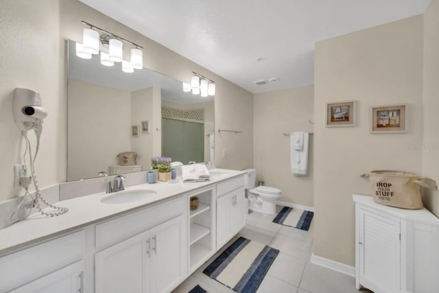 full bathroom with toilet, tile patterned floors, a sink, and double vanity