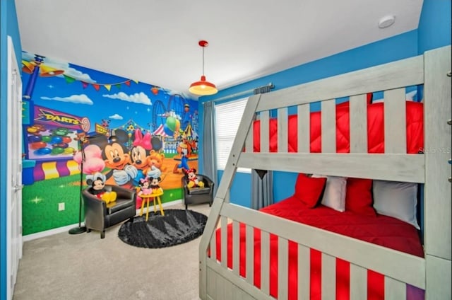 bedroom with baseboards and carpet floors