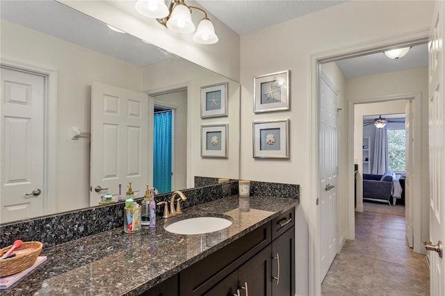 bathroom with vanity and tile patterned flooring