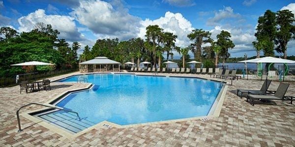 view of swimming pool with a gazebo and a patio area