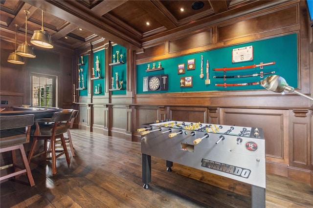 playroom with wood ceiling, wood-type flooring, coffered ceiling, crown molding, and beam ceiling