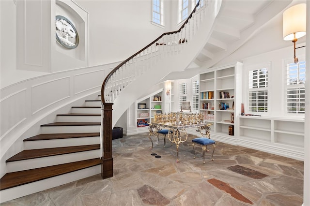 staircase with built in shelves
