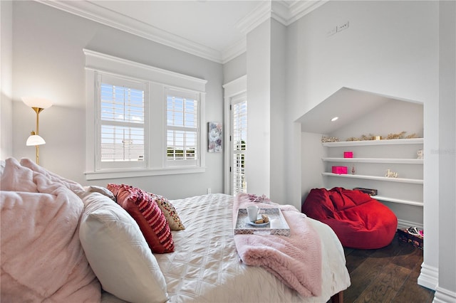 bedroom featuring dark hardwood / wood-style flooring and crown molding