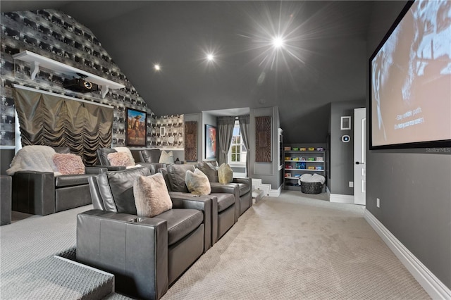 carpeted cinema with vaulted ceiling