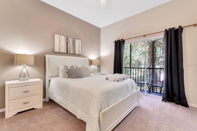 bedroom featuring light carpet, ceiling fan, and access to exterior