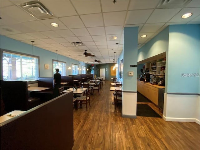 interior space featuring ceiling fan