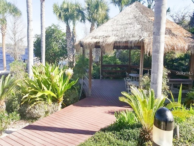 wooden deck featuring a gazebo