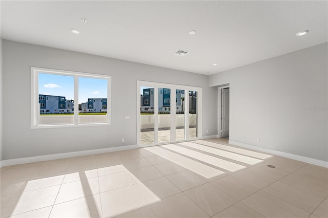 empty room featuring light tile patterned flooring