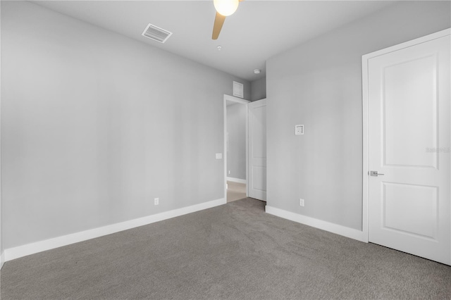 unfurnished bedroom featuring ceiling fan and carpet floors