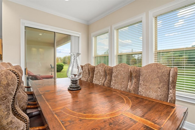 dining room featuring ornamental molding