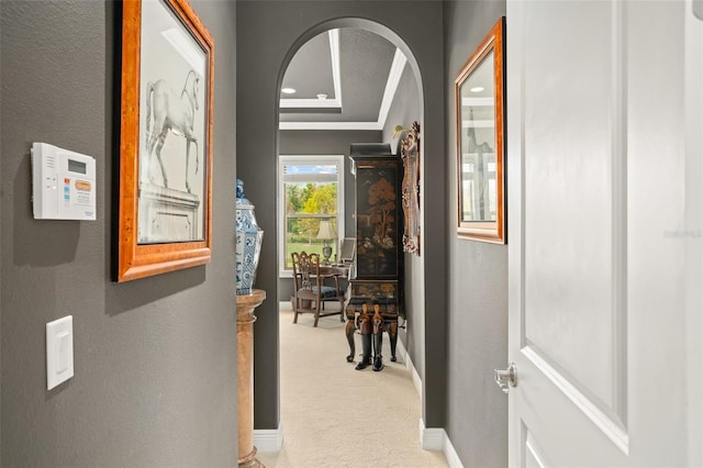 14372 Sunbridge Cir, Winter Garden, FL 34787 - corridor with arched walkways, carpet flooring, crown molding, and a textured wall