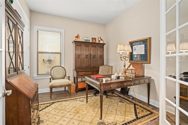 14372 Sunbridge Cir, Winter Garden, FL 34787 - home office with baseboards and light wood-type flooring