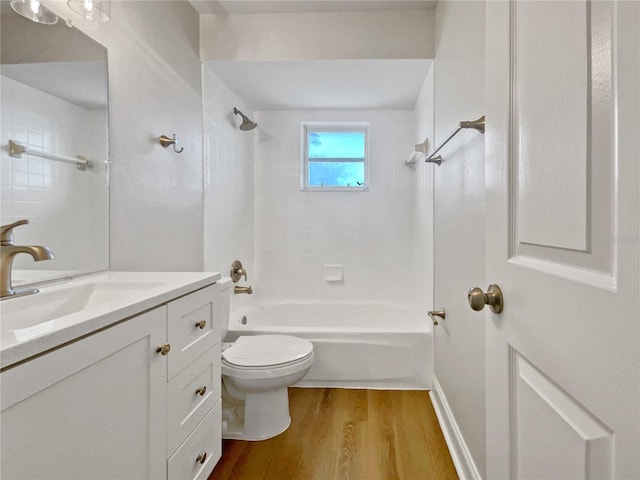 full bathroom featuring shower / washtub combination, toilet, vanity, and hardwood / wood-style flooring