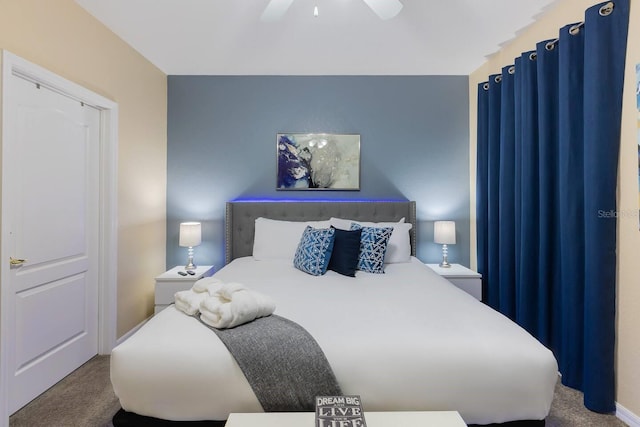 carpeted bedroom featuring ceiling fan