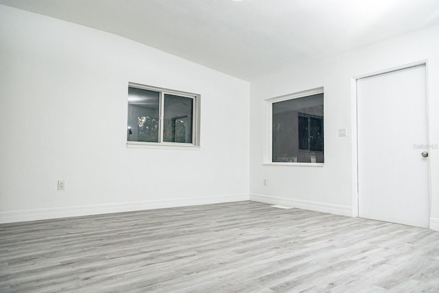 unfurnished room featuring hardwood / wood-style floors