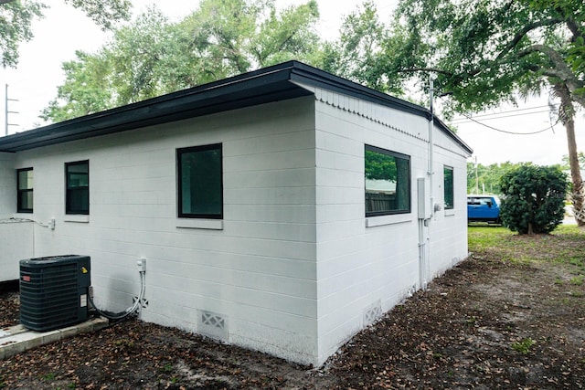 view of home's exterior with central AC