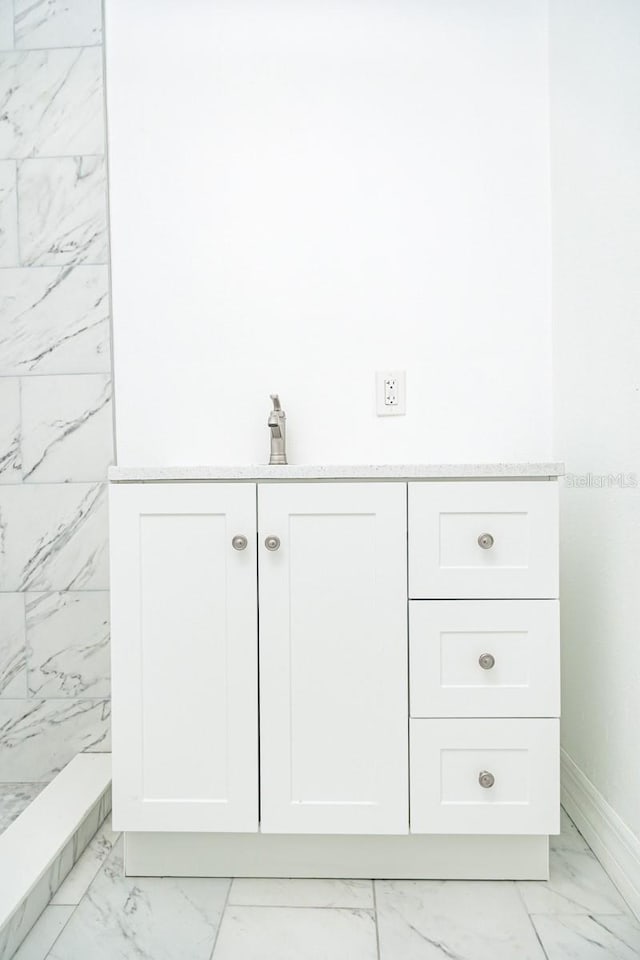 interior space featuring tile patterned floors and sink