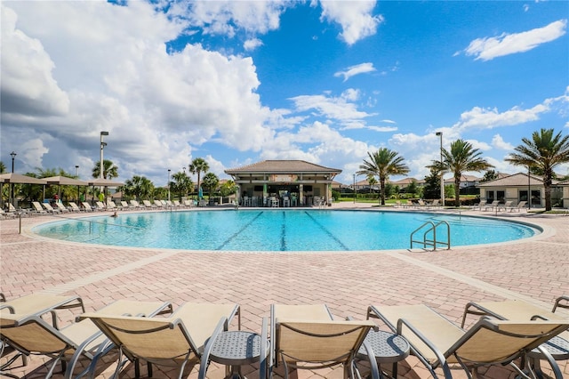 view of pool featuring a patio