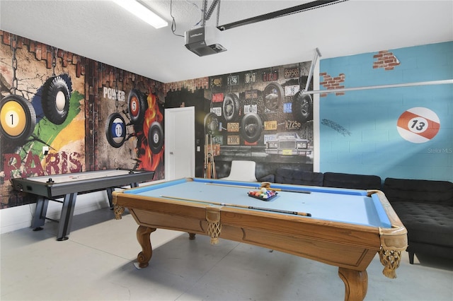 rec room with a textured ceiling and billiards