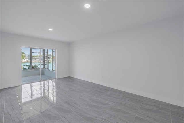 view of tiled spare room