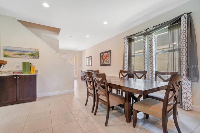 dining room featuring light tile patterned flooring