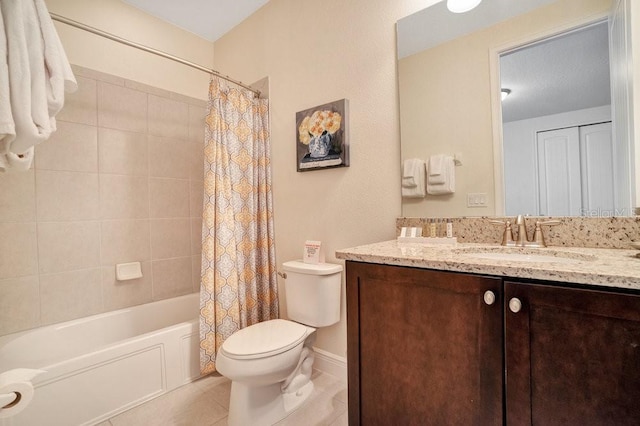 full bathroom with vanity, toilet, tile patterned floors, and shower / bath combo