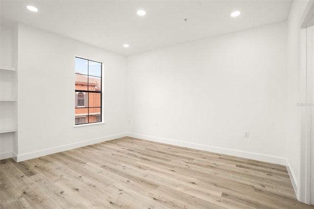 empty room featuring light hardwood / wood-style floors