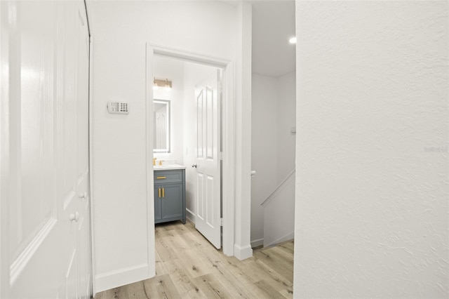 corridor featuring light hardwood / wood-style flooring