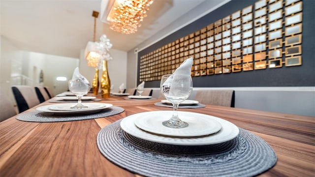 dining room with a notable chandelier