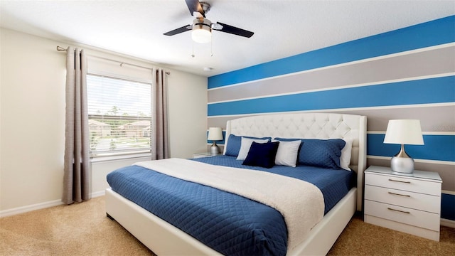 bedroom featuring light carpet and ceiling fan