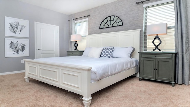 bedroom with light colored carpet