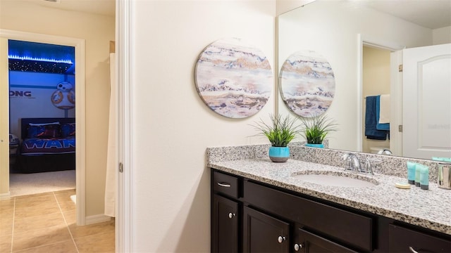 bathroom featuring tile patterned floors and vanity