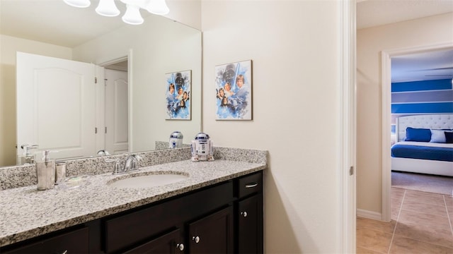 bathroom with tile patterned floors and vanity