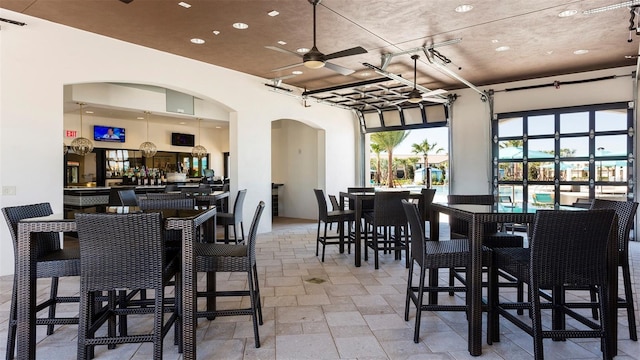 dining area with ceiling fan