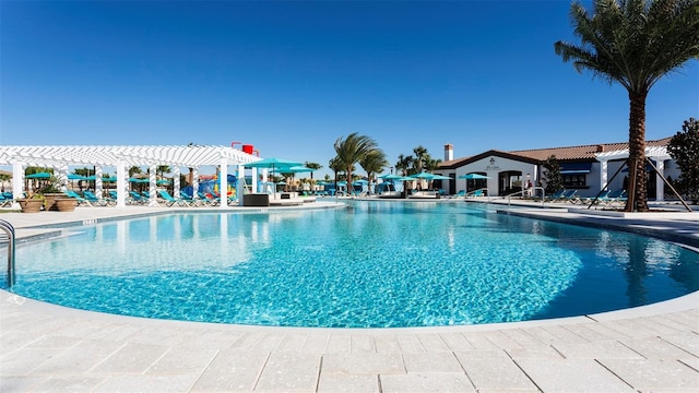 view of pool with a pergola