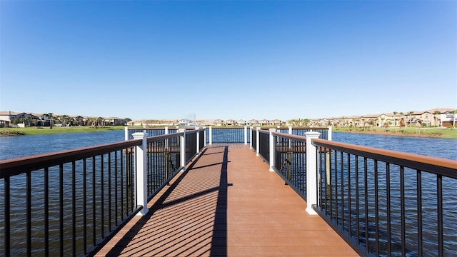 dock area with a water view