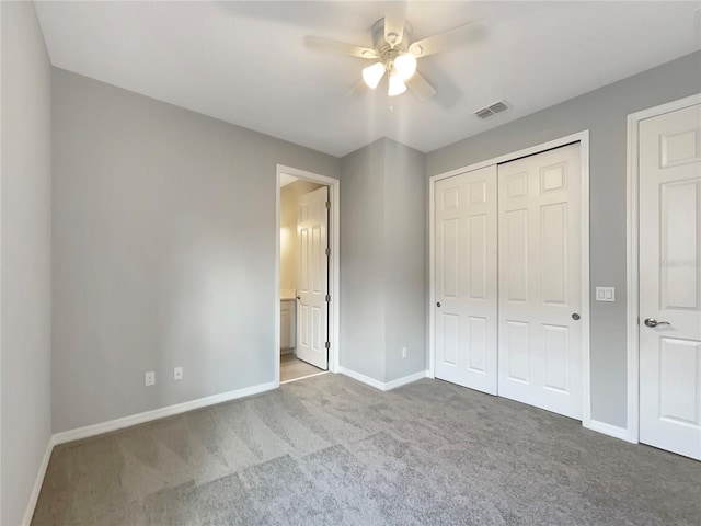 unfurnished bedroom with ceiling fan and light carpet