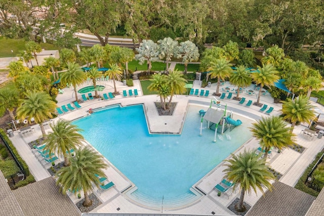 view of swimming pool featuring a patio