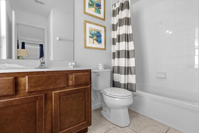 full bathroom with shower / bath combo, toilet, vanity, and tile flooring