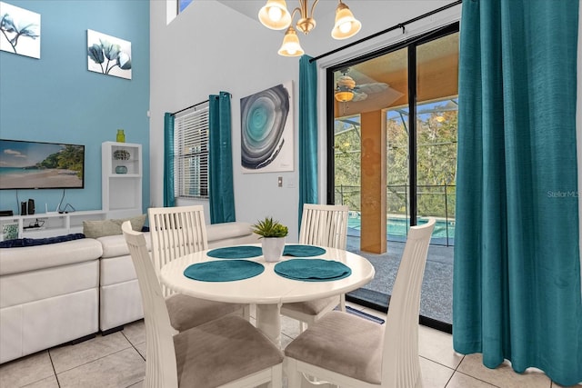 dining room with light tile floors and a notable chandelier