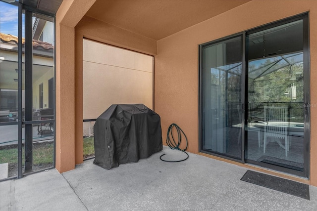 view of patio with a grill