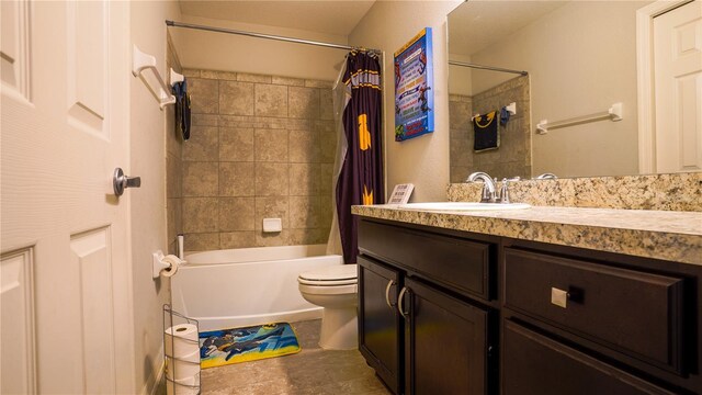 bathroom featuring toilet, shower / bath combo, and vanity