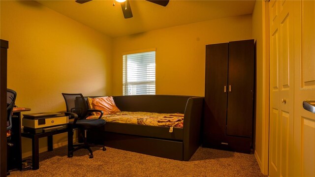 carpeted bedroom featuring ceiling fan