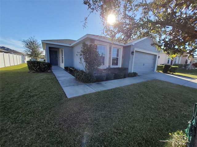 ranch-style house featuring stucco siding, an attached garage, a front yard, fence, and driveway